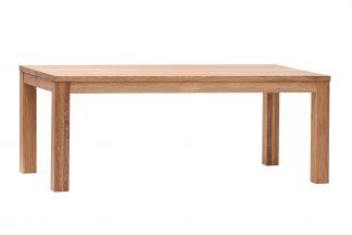 Jídelní stůl Korund vytvořený z pevného a kvalitního dubového masivu, je symbolem tradičního řemeslného umění, kombinovaného s moderní flexibilitou.