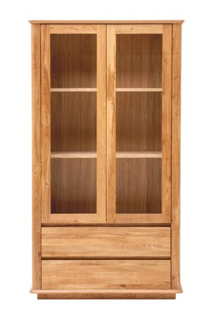 Skříň do obýváku Celin z masivního dubového dřeva spojuje eleganci prosklené vitríny s praktičností úložných zásuvek. Díky čistým liniím, oblinám a přirozené kresbě dřeva působí nadčasově a zútulní každý interiér.